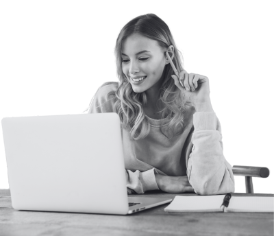 Woman on a laptop in black and white